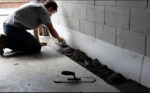 Man applying cement