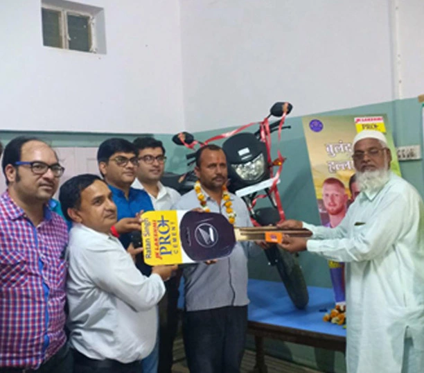 Bike handover ceremony with group of men